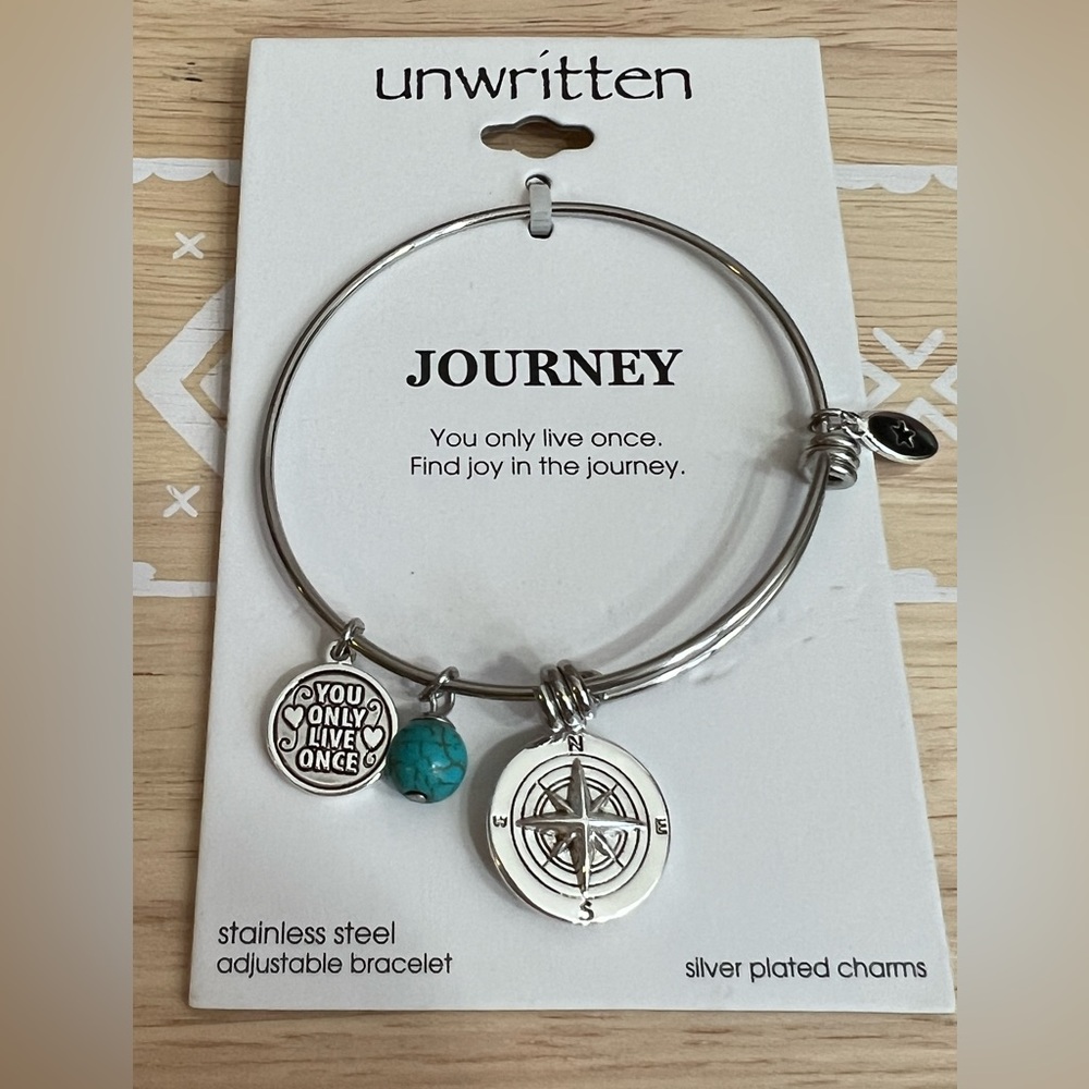 NWT Unwritten Journey stainless steel adjustable charm bracelet.